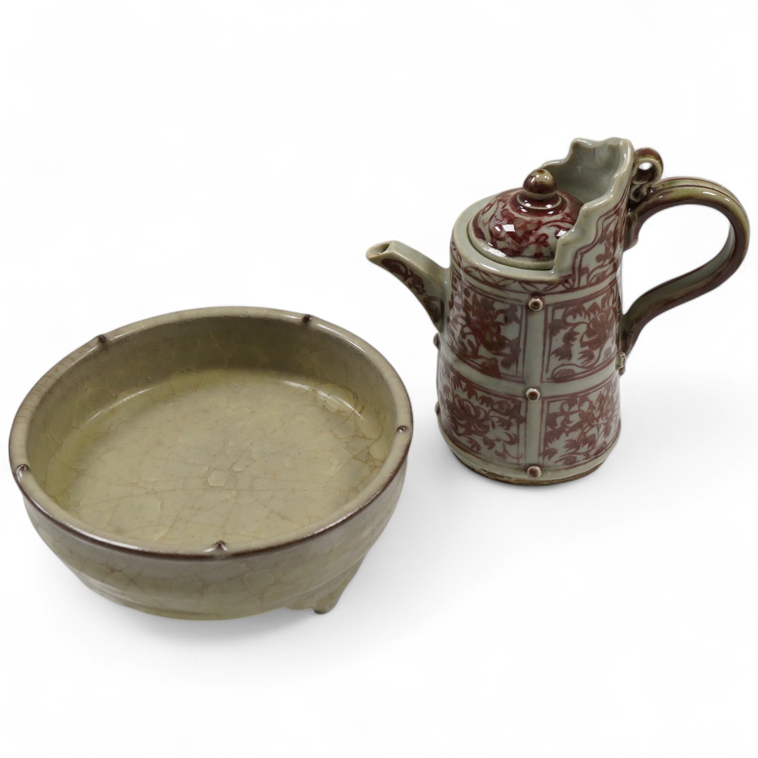 A Chinese underglaze copper red ewer and cover and a crackle glaze tripod dish, 17.5cm high